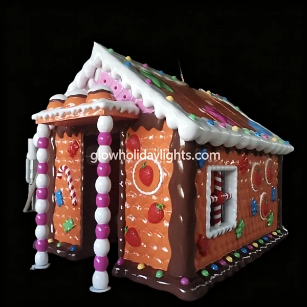 Christmas Giant Gingerbread House Decoration This whimsical giant gingerbread house features classic candy details, including candy cane pillars, strawberry accents, and colorful sprinkles. A showstopping Christmas decor piece, perfect for outdoor yards, malls, and holiday events to create a magical, sweet festive atmosphere.